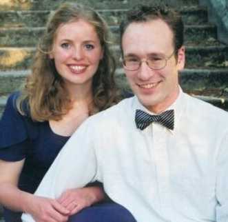 Catherine seated on stairs with Weston, June 2001