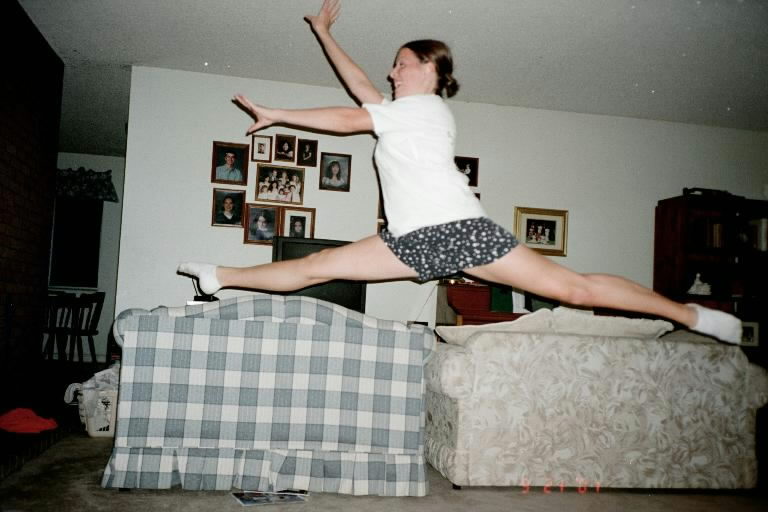 Erica leaps in living room, October, 2001
